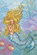 A Mermaids Dotted Journal